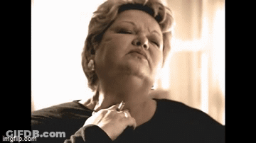 A Woman 'S Neck Is Shown In A Black And White Photo With The Url Imgflip.com At The Bottom GIF