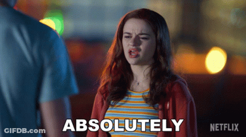 A Woman Says Absolutely In Front Of A Man In A Striped Shirt GIF