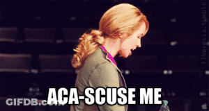 A Woman Says " Aca-Scuse Me " While Holding A Bottle GIF