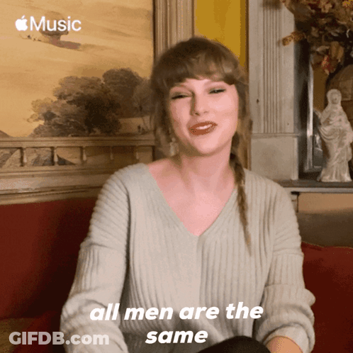 A Woman Says All Men Are The Same In Front Of A Picture GIF
