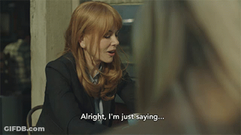 A Woman Says Alright I 'M Just Saying While Sitting At A Table GIF