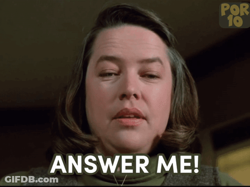 A Woman Says " Answer Me " In Front Of A Por 19 Logo GIF