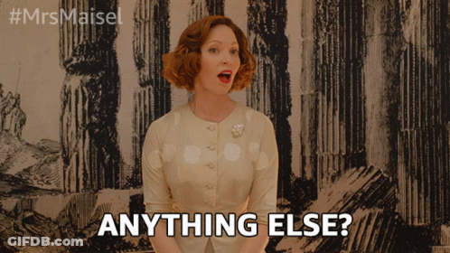 A Woman Says Anything Else In Front Of A Drawing GIF
