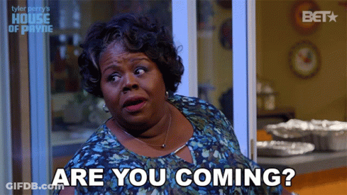 A Woman Says " Are You Coming " In Front Of A Window GIF