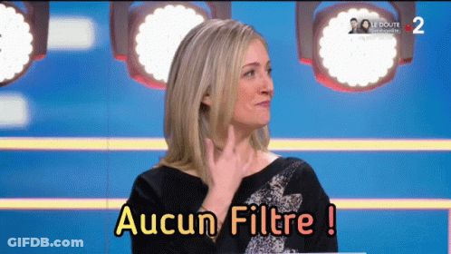 A Woman Says Aucun Filtre In A Foreign Language GIF