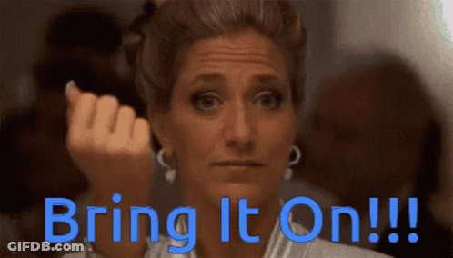 A Woman Says Bring It On In Blue GIF