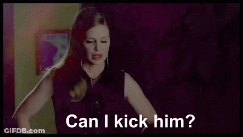 A Woman Says Can I Kick Him In A Purple Room GIF
