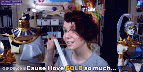 A Woman Says " Cause I Love Gold So Much " In Front Of A Mannequin GIF