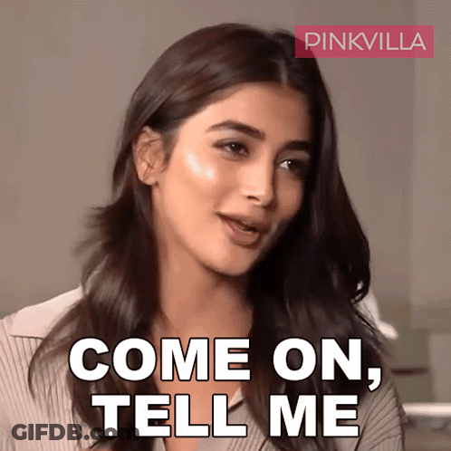 A Woman Says Come On Tell Me With A Pinkvilla Logo Behind Her GIF