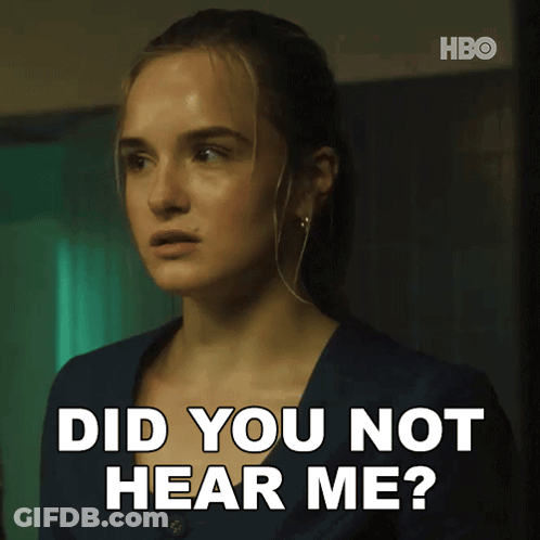 A Woman Says Did You Not Hear Me While Wearing Ear Buds GIF