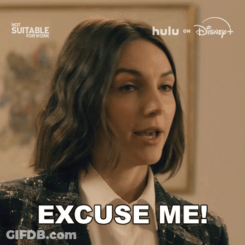 A Woman Says " Excuse Me " In Front Of A Hulu Logo GIF