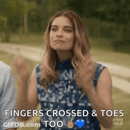 A Woman Says Fingers Crossed And Toes Too In A GIF