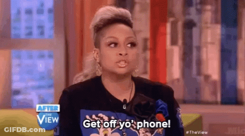 A Woman Says Get Off Yo ' Phone On A Television Show . GIF