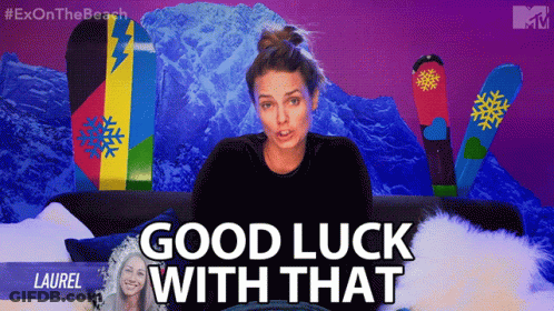A Woman Says Good Luck With That In Front Of A Mountain GIF