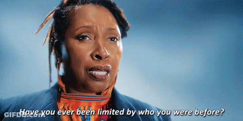 A Woman Says " Have You Ever Been Limited By Who You Were Before " In Front Of A Blue Background GIF