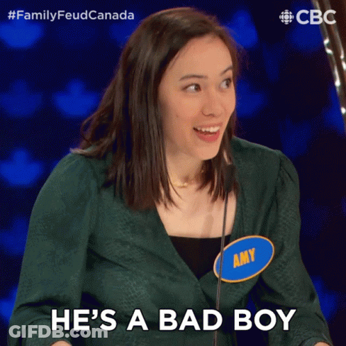 Woman Holding Microphone Saying Bad Boy GIF