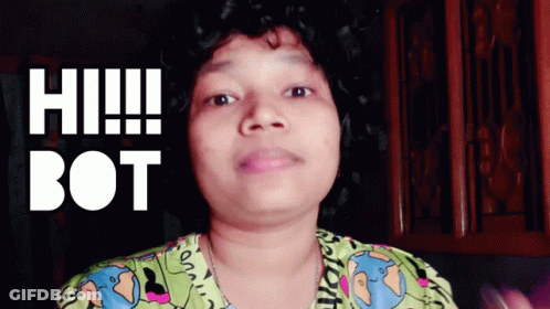 A Woman Says Hi Bot In Front Of A Dark Background GIF