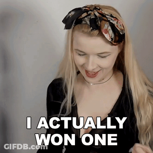A Woman Says I Actually Won One In A Black Shirt GIF