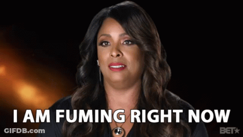 A Woman Says I Am Fuming Right Now In Front Of A Black Background GIF