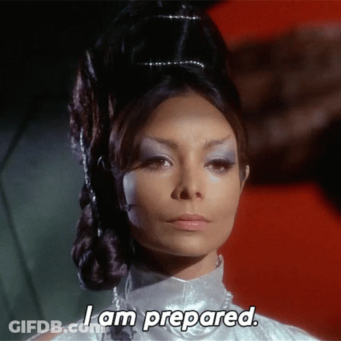 A Woman Says I Am Prepared While Wearing A White Dress GIF