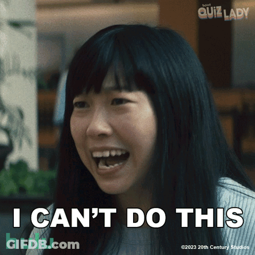 A Woman Says " I Can 'T Do This " In Front Of A Poster For Quiz Lady GIF