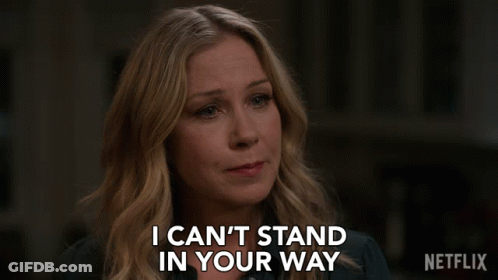 A Woman Says I Can 'T Stand In Your Way In Front Of A Netflix Logo GIF