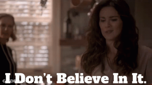 A Woman Says " I Don 'T Believe In It " While Another Woman Looks On GIF