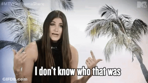 Woman Saying I Don't Know Who That Was In Front Of Palm Trees GIF