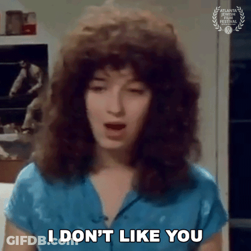 Woman In Blue Shirt Saying I Don't Like You GIF