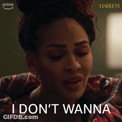 A Woman Says " I Don 'T Wanna " In Front Of A Harlem Sign GIF