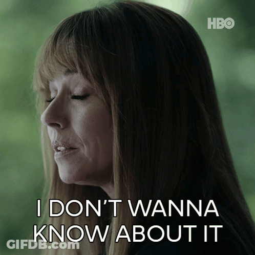 A Woman Says " I Don T Wanna Know About It " In Front Of A Green Background GIF