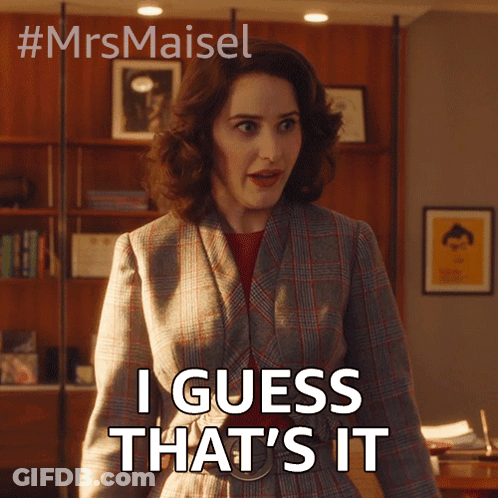 A Woman Says I Guess That 'S It In Front Of A Wooden Wall GIF