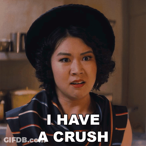 A Woman Says I Have A Crush While Wearing A Black Hat GIF