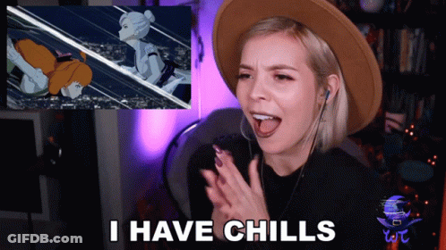 A Woman Says I Have Chills In Front Of A Picture GIF