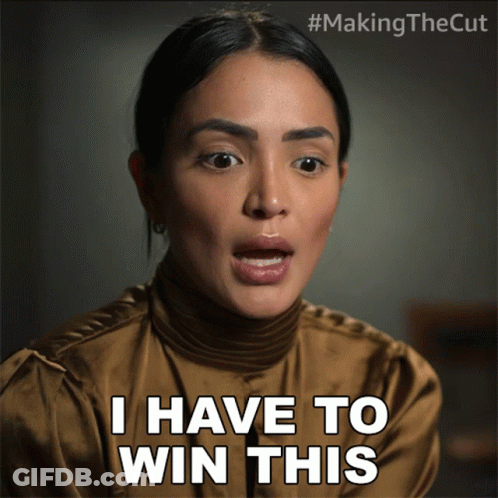 A Woman Says " I Have To Win This " While Wearing A Brown Shirt GIF