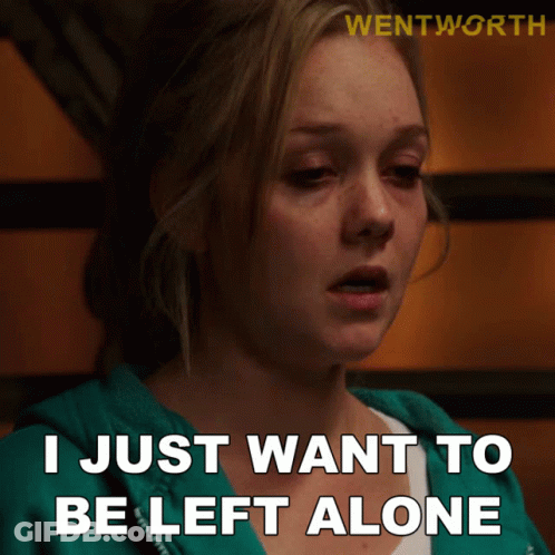 A Woman Says " I Just Want To Be Left Alone " In Front Of A Sign That Says Wentworth GIF
