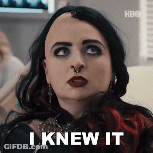 A Woman Says I Knew It In Front Of A Hbo Sign GIF