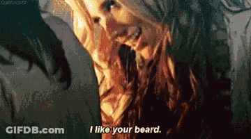 A Woman Says I Like Your Beard In A Pixelated Image GIF
