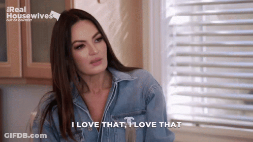 A Woman Says I Love That In Front Of A Window GIF