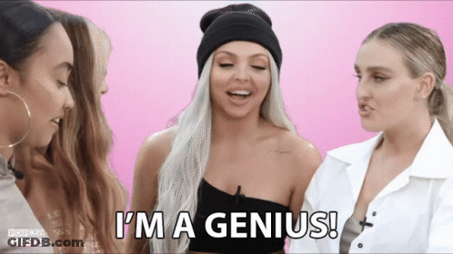 A Woman Says " I 'M A Genius " While Standing Next To Two Other Women GIF