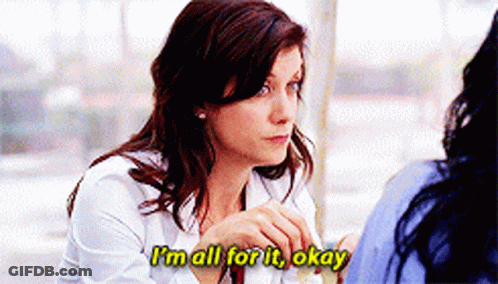 Woman Saying Im All For It Okay At Table GIF