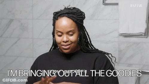 A Woman Says " I 'M Bringing Out All The Goodies " GIF