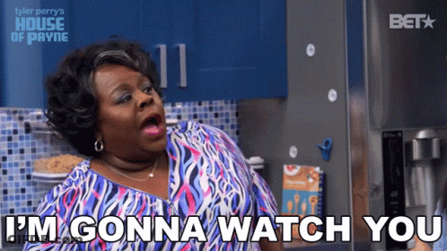 A Woman Says " I 'M Gonna Watch You " In A Kitchen GIF
