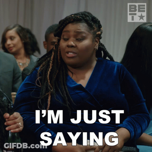 A Woman Says I 'M Just Saying In A Blue Dress GIF