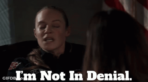 A Woman Says " I 'M Not In Denial " In Front Of Another Woman GIF