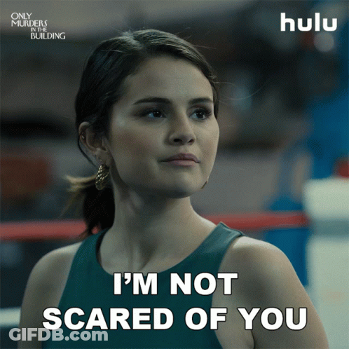 A Woman Says " I 'M Not Scared Of You " In A Boxing Ring GIF