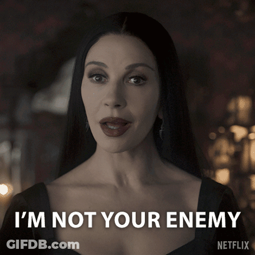 A Woman Says I 'M Not Your Enemy In A Netflix Advertisement GIF