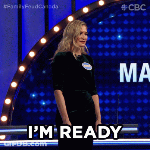 A Woman Says I 'M Ready While Standing In Front Of A Podium GIF