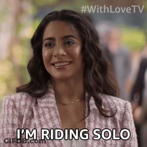 A Woman Says I 'M Riding Solo In A Pink Jacket GIF