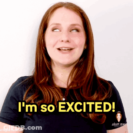A Woman Says I 'M So Excited In Front Of A White Background GIF